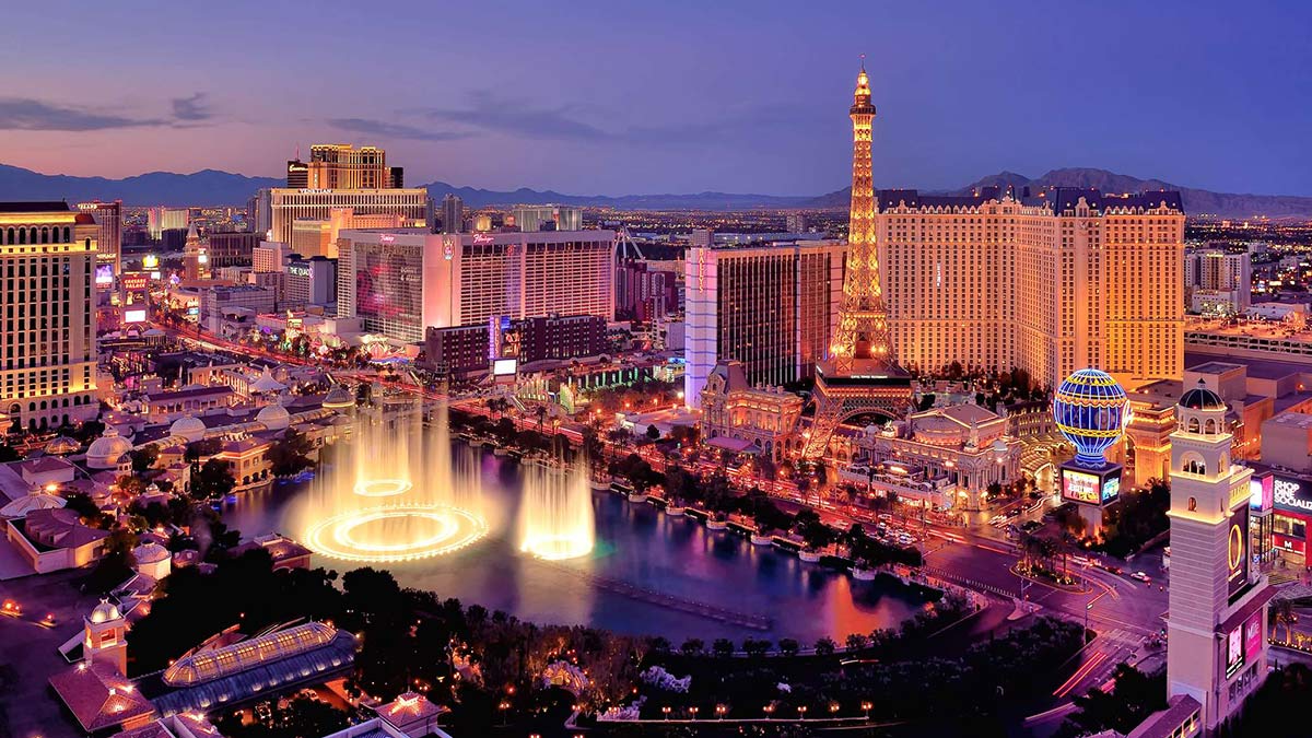 City skyline at night with Bellagio Hotel water fountains, Las Vegas, Nevada, America, USA